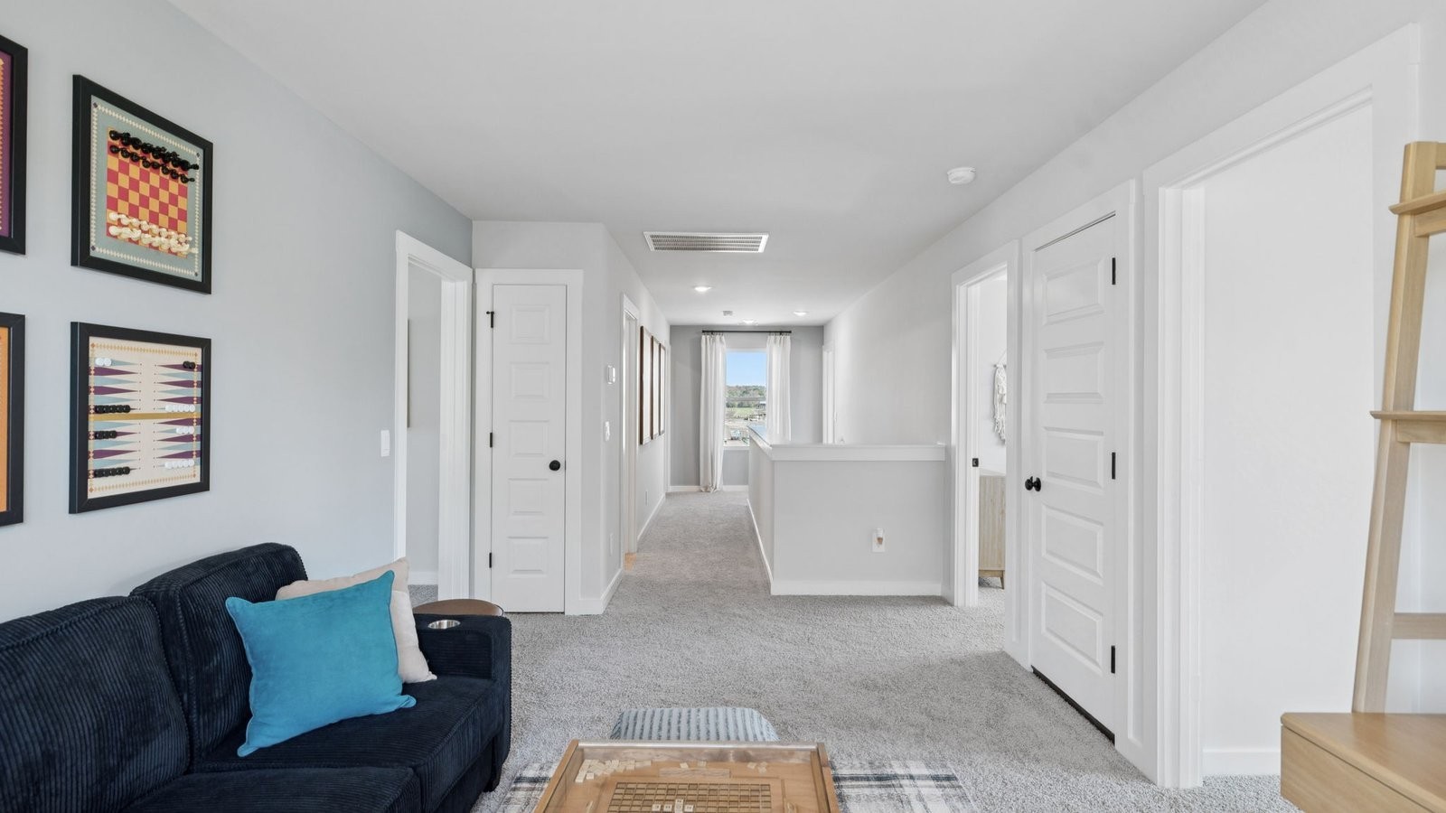 305 Harvest Point Boulevard Spring Hill, TN 37174 - Photo 33 of 48 a living room with furniture and a walk in closet