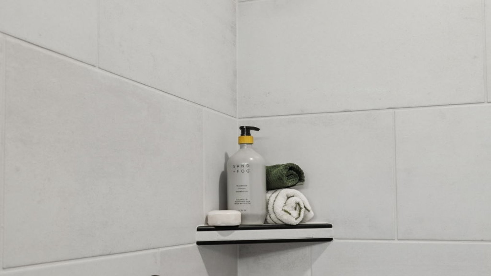 305 Harvest Point Boulevard Spring Hill, TN 37174 - Photo 38 of 48 a bathroom with a sink and a mirror