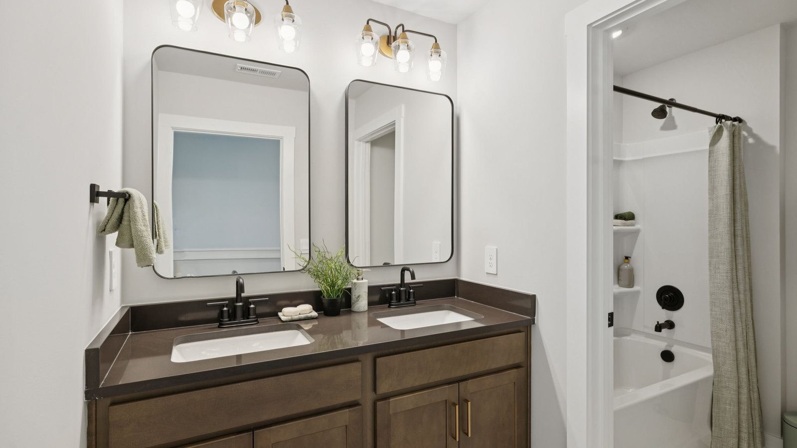 305 Harvest Point Boulevard Spring Hill, TN 37174 - Photo 42 of 48 a bathroom with a double vanity sink mirror and double