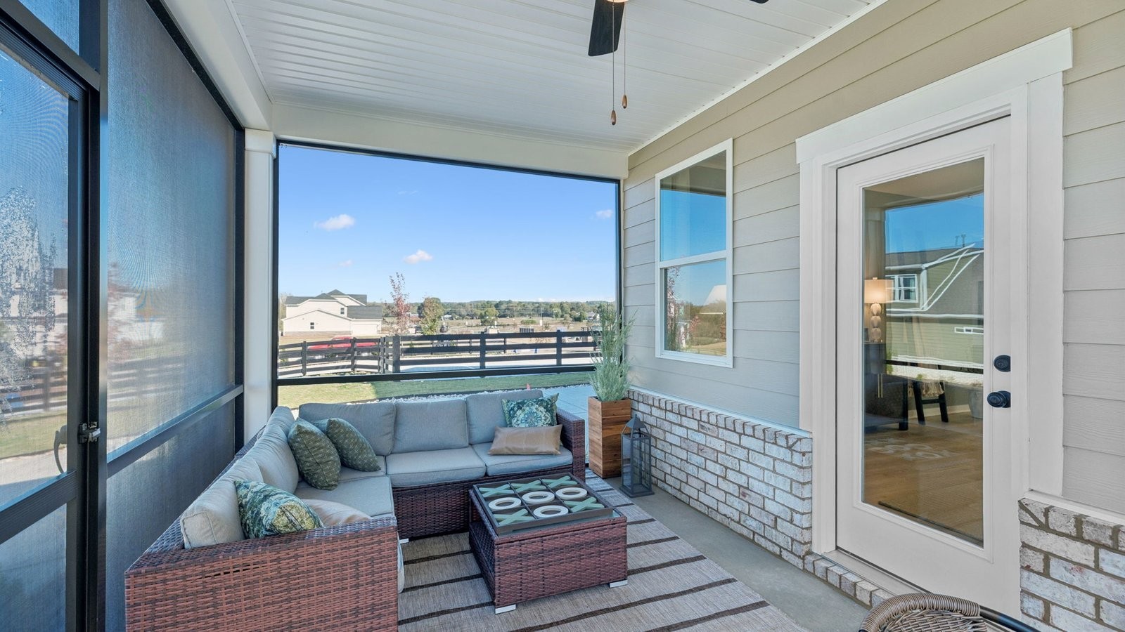 305 Harvest Point Boulevard Spring Hill, TN 37174 - Photo 45 of 48 a outdoor living space with furniture and a rug