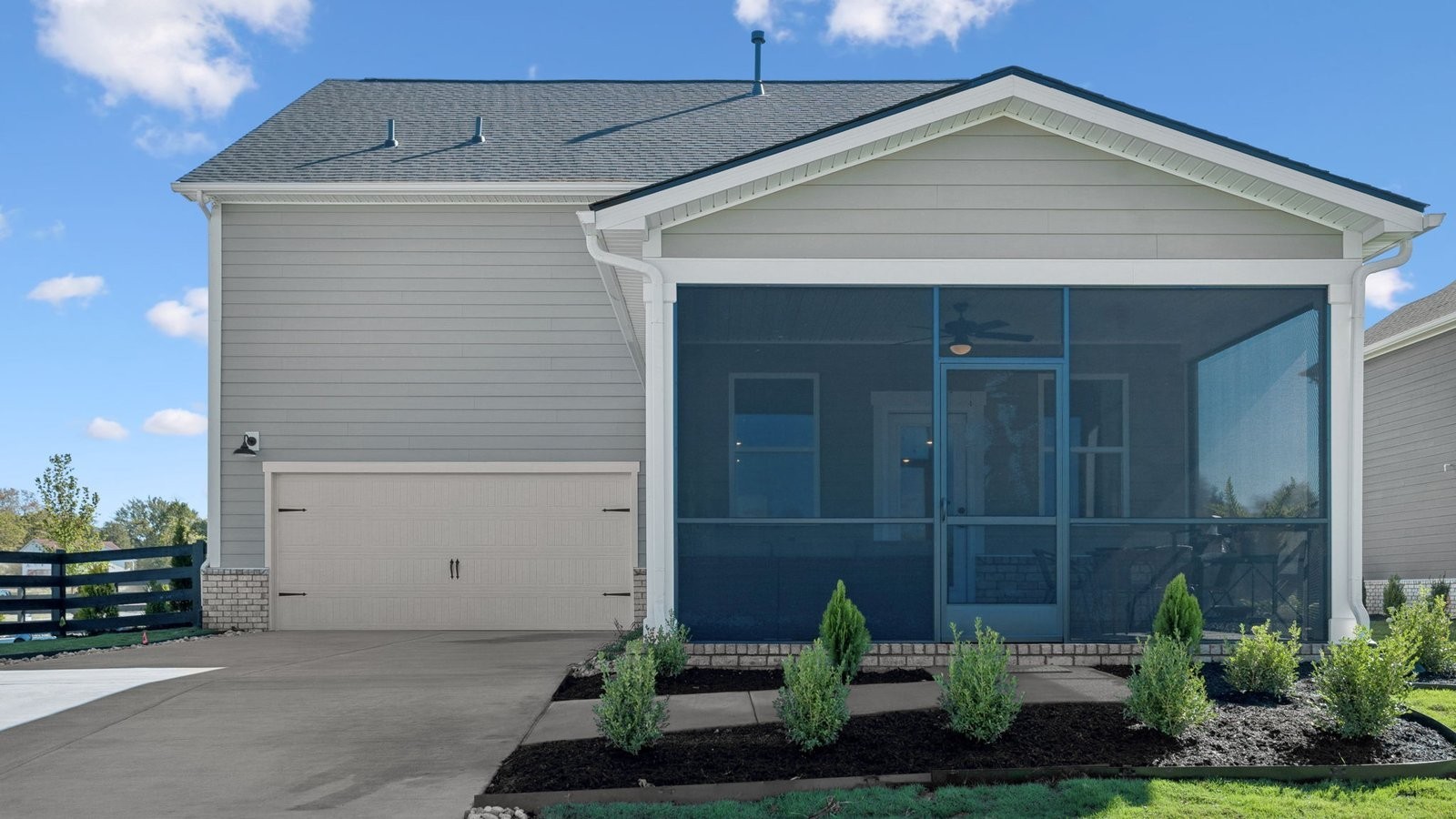 305 Harvest Point Boulevard Spring Hill, TN 37174 - Photo 48 of 48 a front view of a house with plants