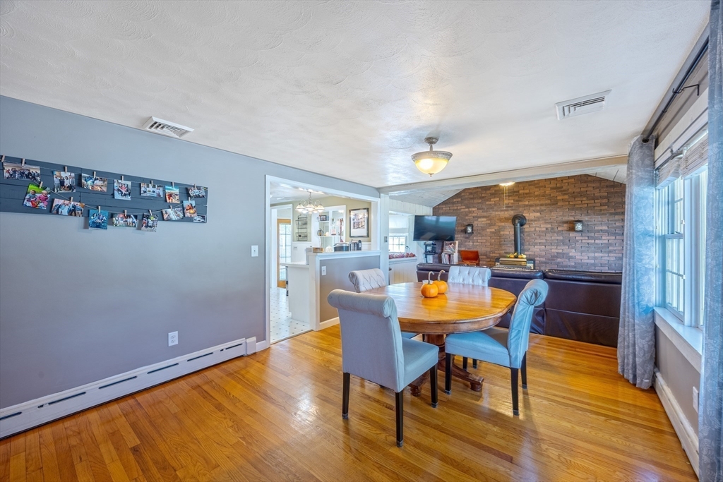 148 Yale Street Ludlow, MA 01056 - Photo 13 of 39 a view of a dining room with furniture and wooden floor
