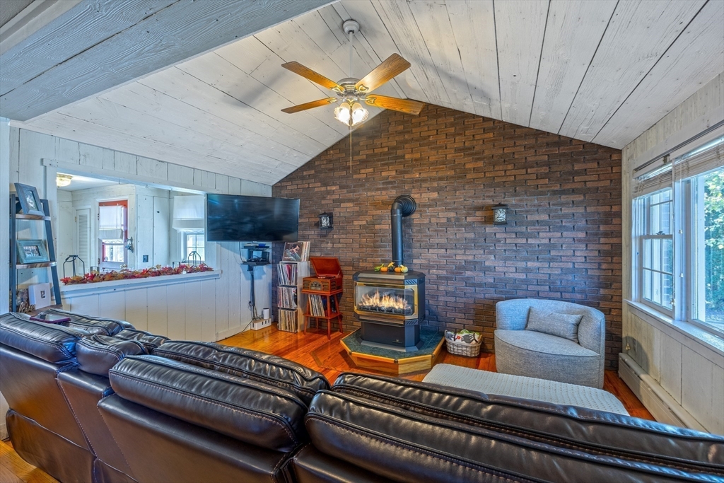 148 Yale Street Ludlow, MA 01056 - Photo 16 of 39 a living room with furniture and a fireplace