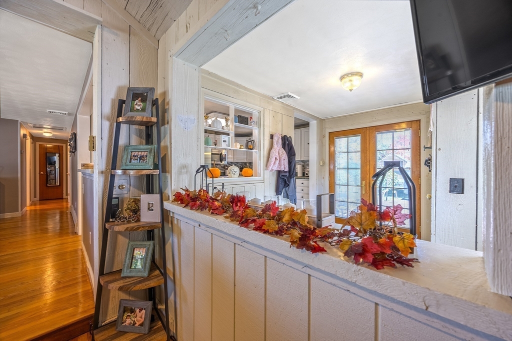 148 Yale Street Ludlow, MA 01056 - Photo 19 of 39 a view of a entryway with flower pots