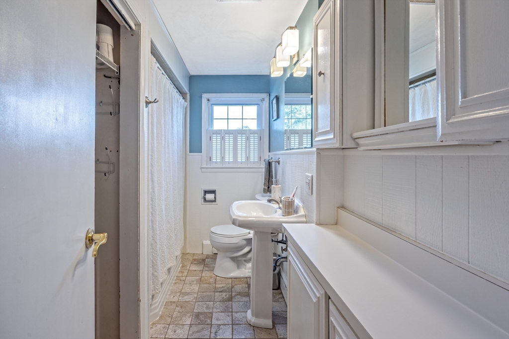 148 Yale Street Ludlow, MA 01056 - Photo 20 of 39 a bathroom with a sink toilet and window