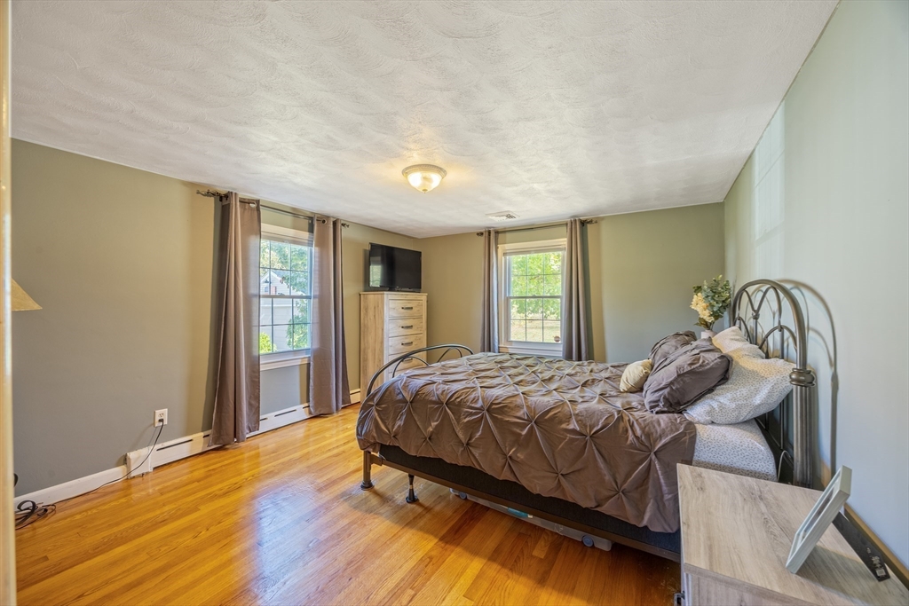 148 Yale Street Ludlow, MA 01056 - Photo 24 of 39 a bedroom with a bed and window