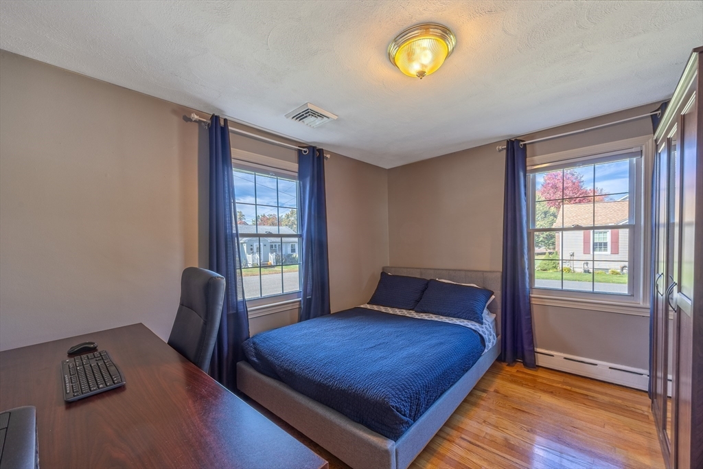 148 Yale Street Ludlow, MA 01056 - Photo 26 of 39 a bedroom with a bed and a window