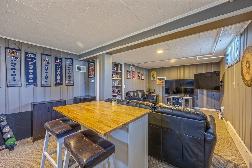 148 Yale Street Ludlow, MA 01056 - Photo 28 of 39 a room with furniture pool table flat screen tv and windows