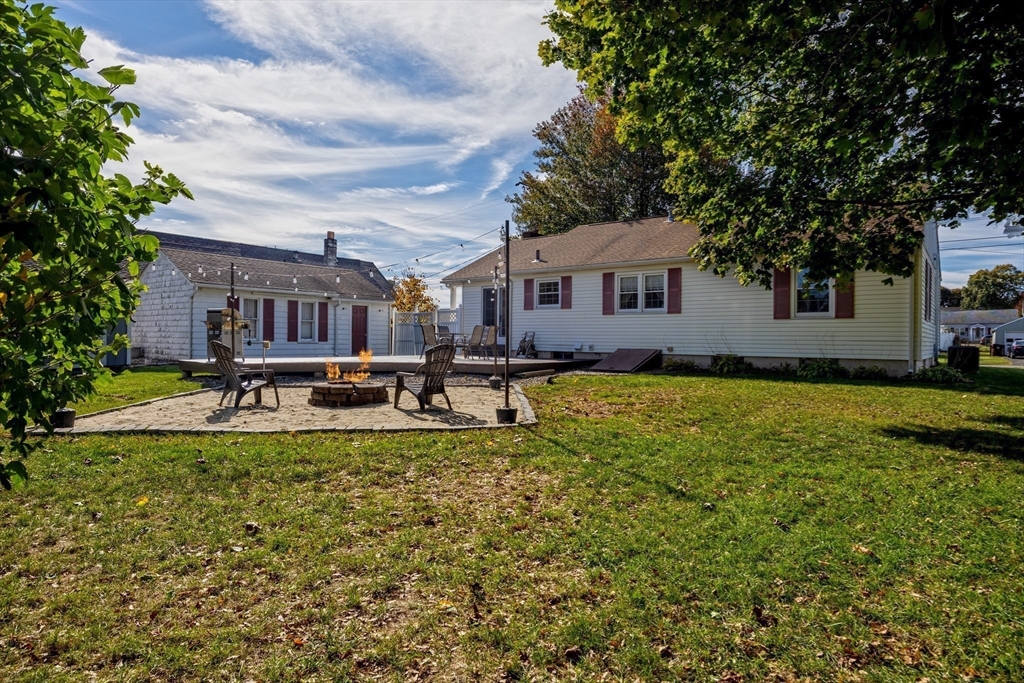 148 Yale Street Ludlow, MA 01056 - Photo 35 of 39 a swimming pool view with a seating space and a garden view