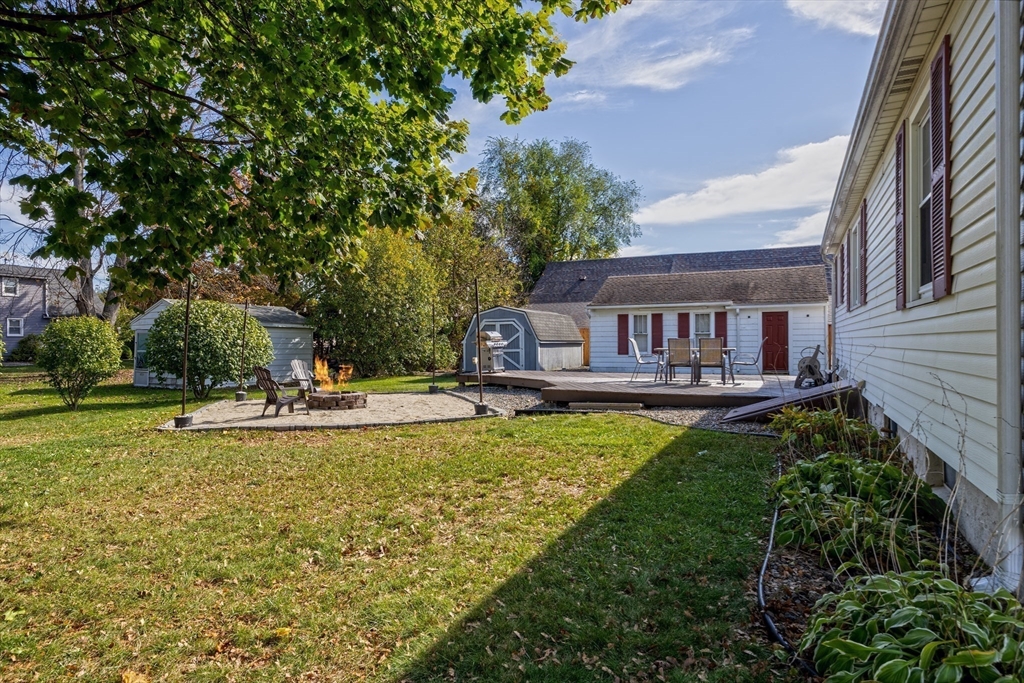 148 Yale Street Ludlow, MA 01056 - Photo 36 of 39 a view of a house with swimming pool and sitting area