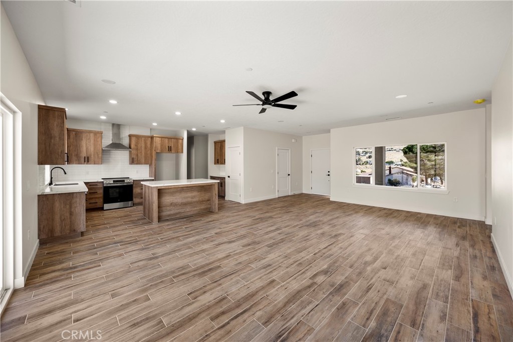22324 Rancho Street Apple Valley, CA 92308 - Photo 14 of 47 a view of kitchen with wooden floor and electronic appliances