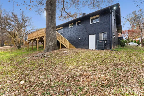 a view of a house with a large window