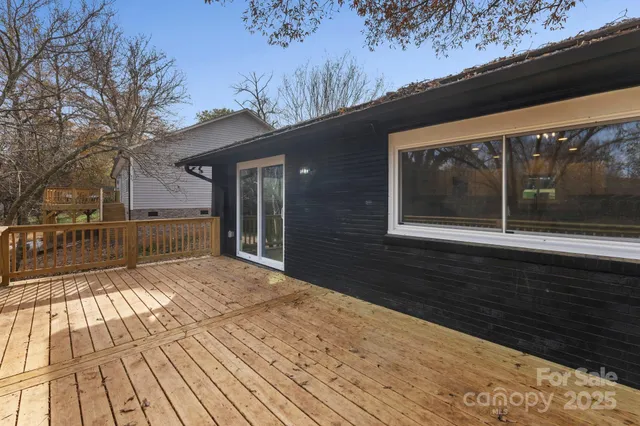 a balcony view with a wooden floor