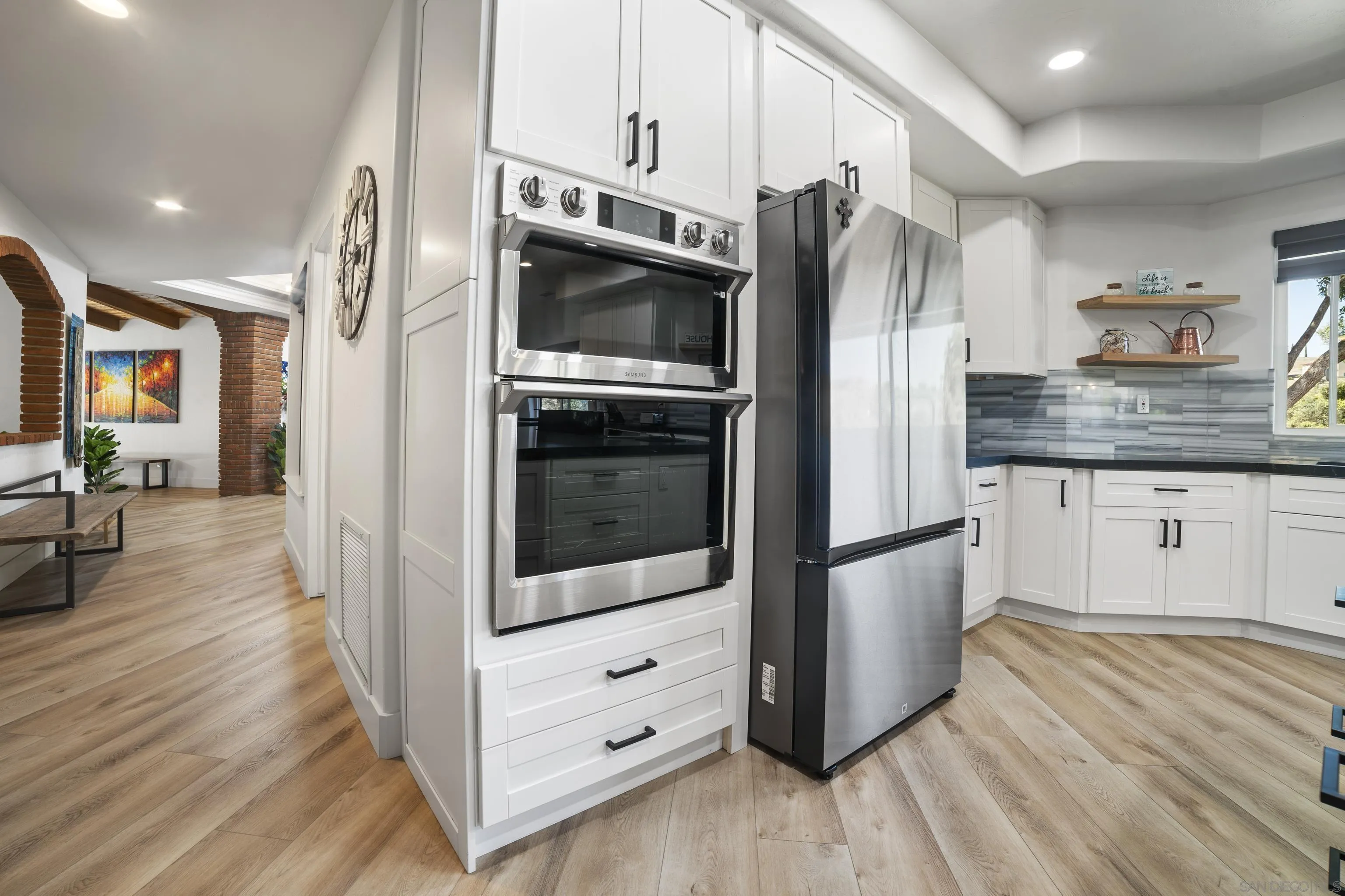 4062 La Canada Road Fallbrook, CA 92028 - Photo 15 of 63 a kitchen with stainless steel appliances a refrigerator a stove and a sink