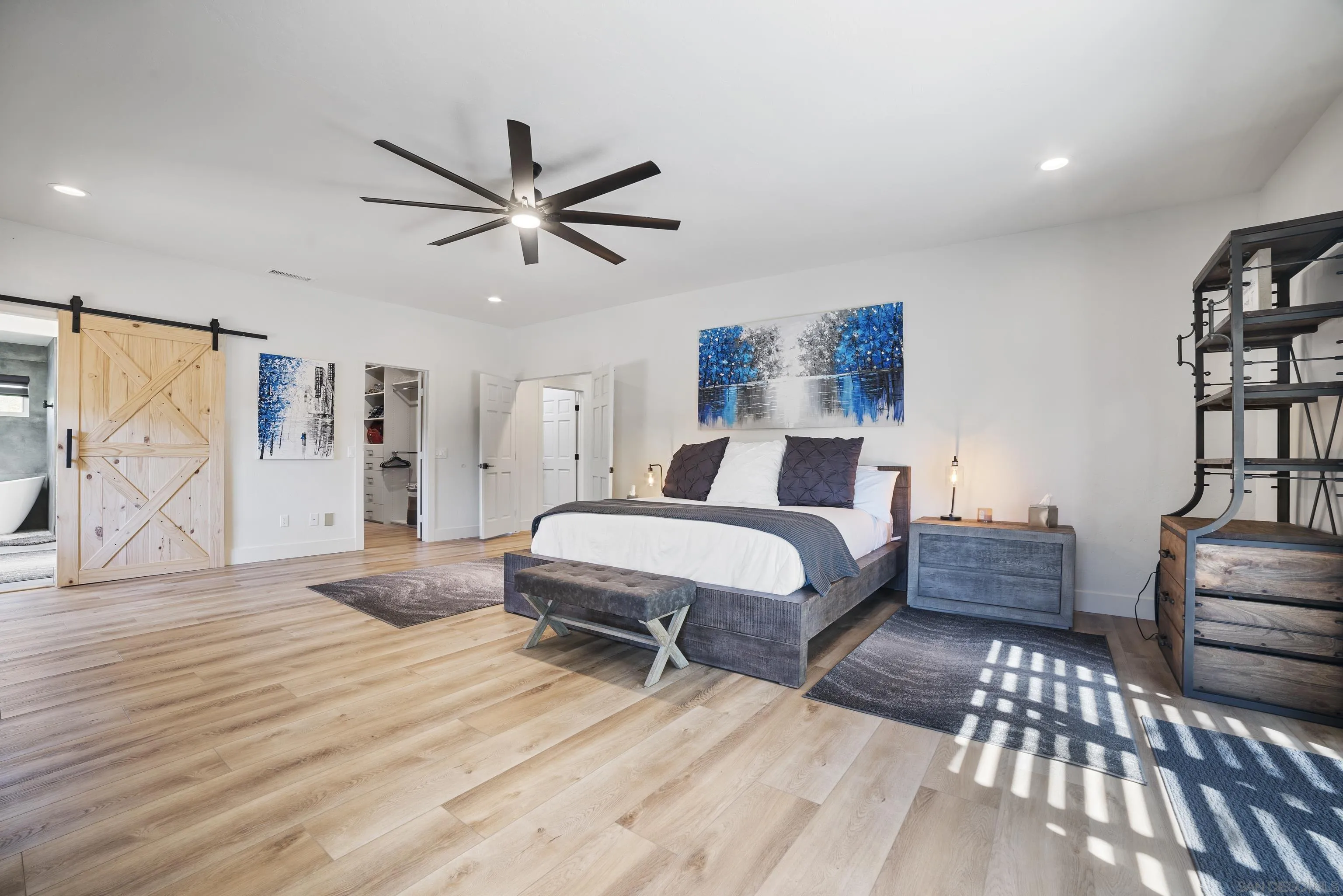 4062 La Canada Road Fallbrook, CA 92028 - Photo 22 of 63 a bedroom with a bed wooden floor and window