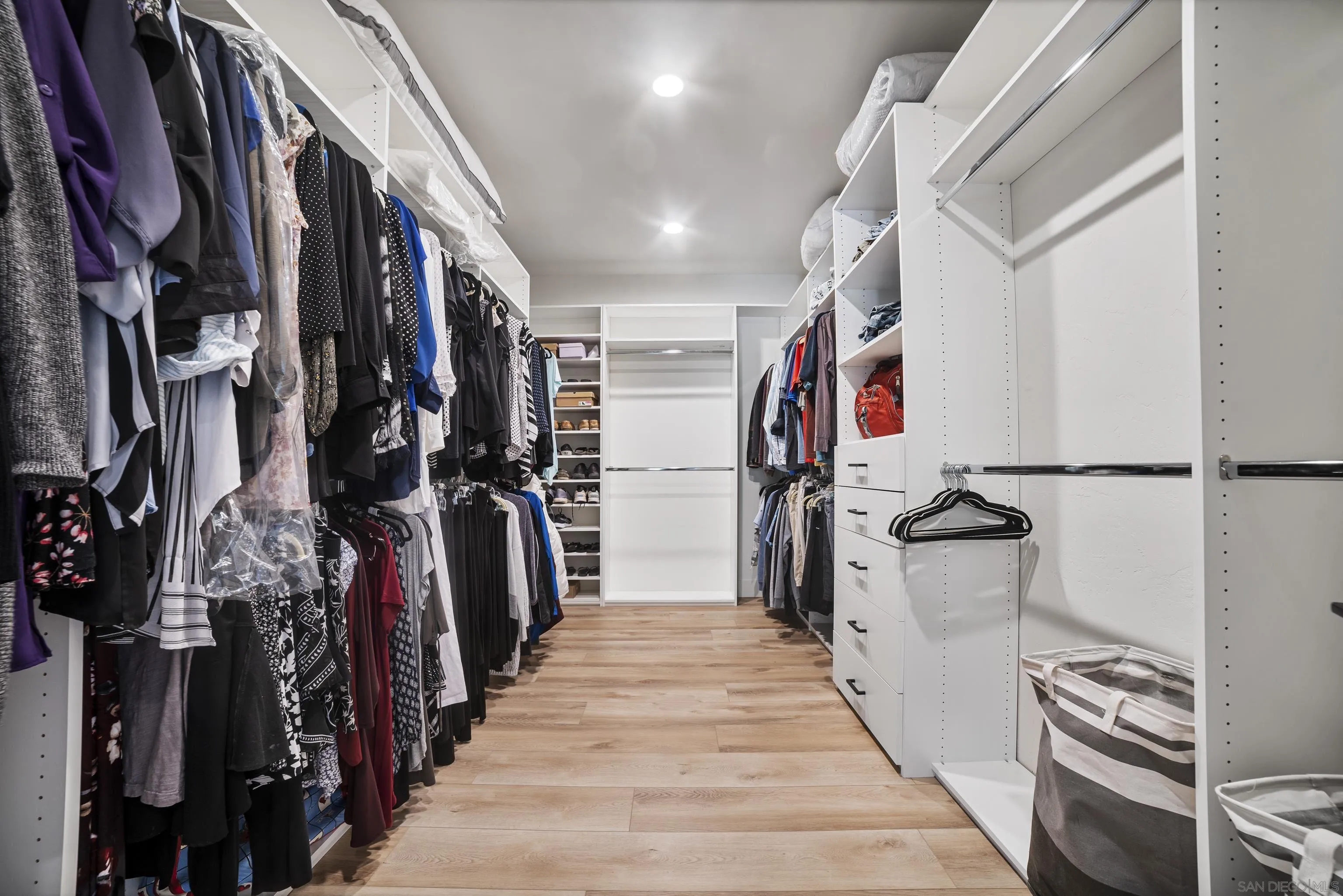 4062 La Canada Road Fallbrook, CA 92028 - Photo 26 of 63 a view of walk in closet with clothes and shoes