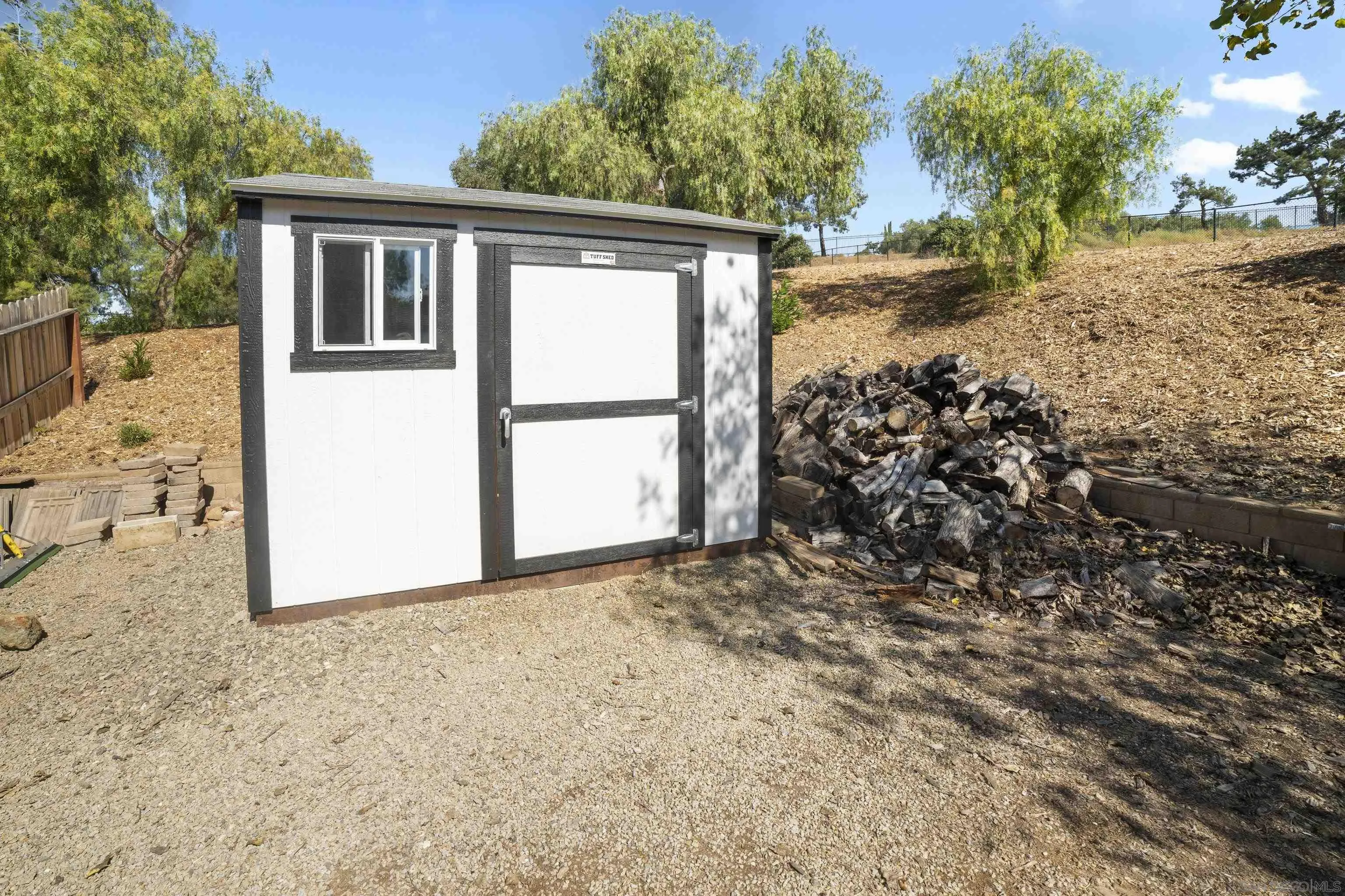 4062 La Canada Road Fallbrook, CA 92028 - Photo 52 of 63 a view of a house with a yard