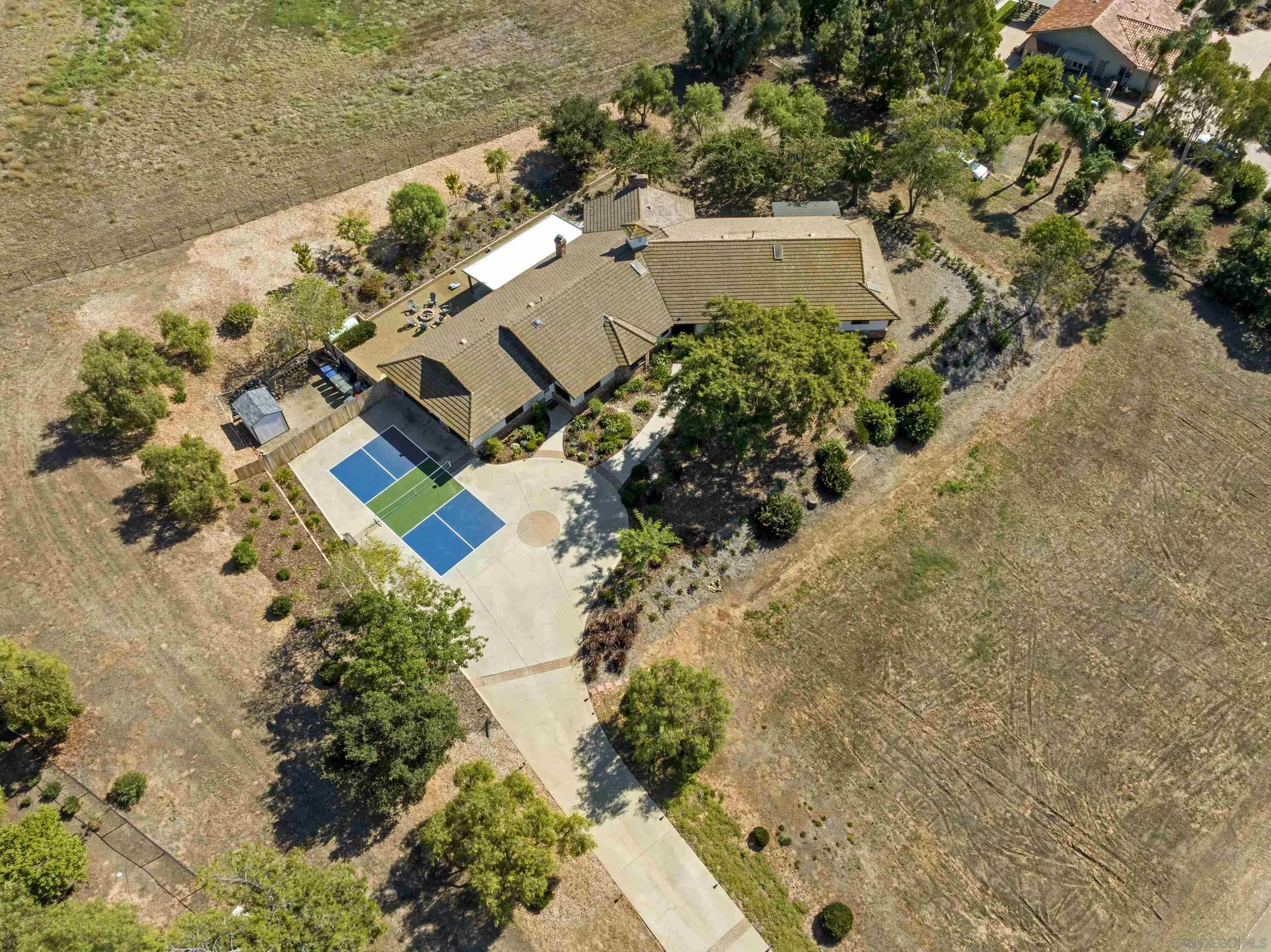 4062 La Canada Road Fallbrook, CA 92028 - Photo 54 of 63 an aerial view of residential house with outdoor space