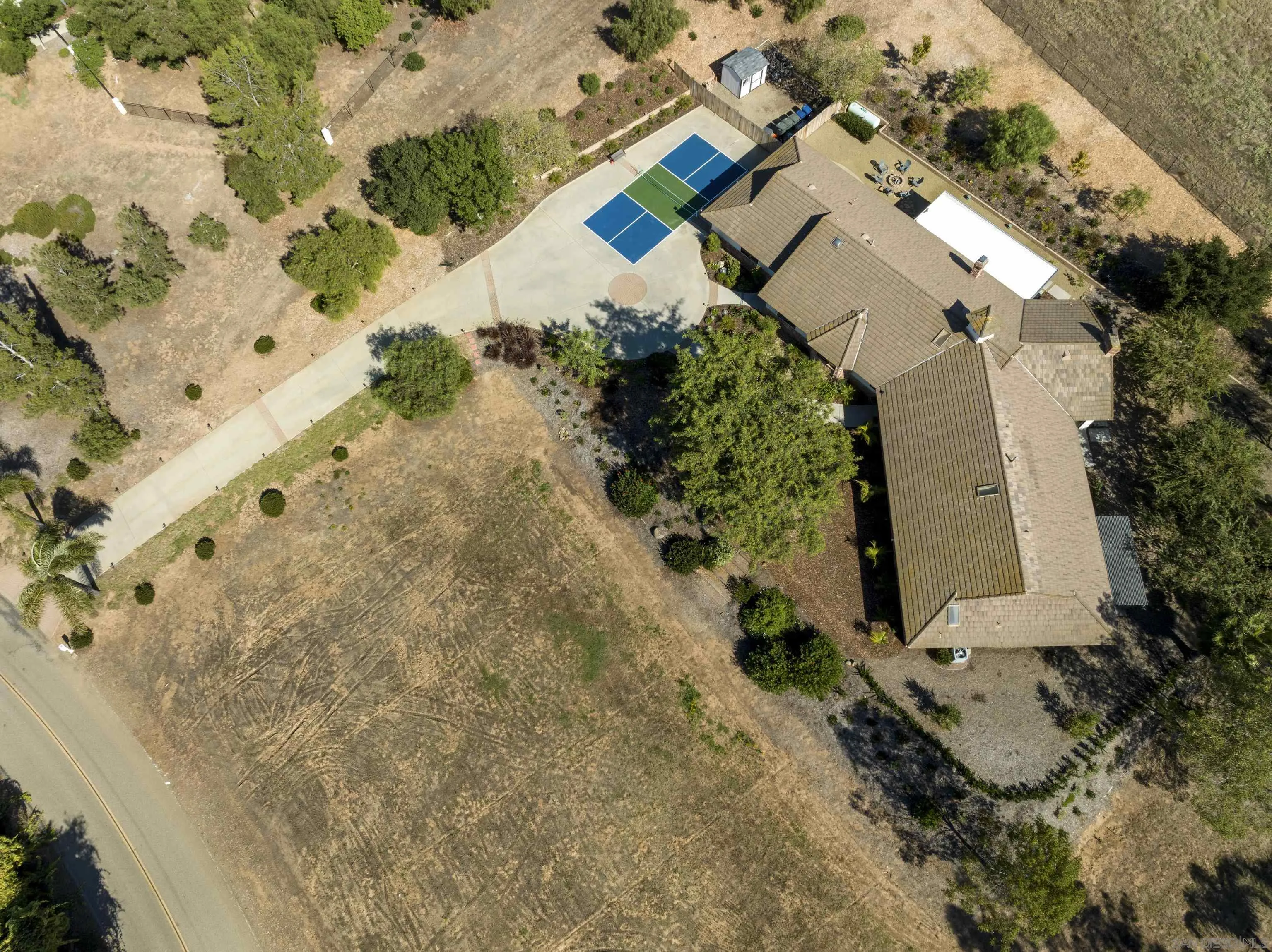 4062 La Canada Road Fallbrook, CA 92028 - Photo 55 of 63 an aerial view of a house with a yard