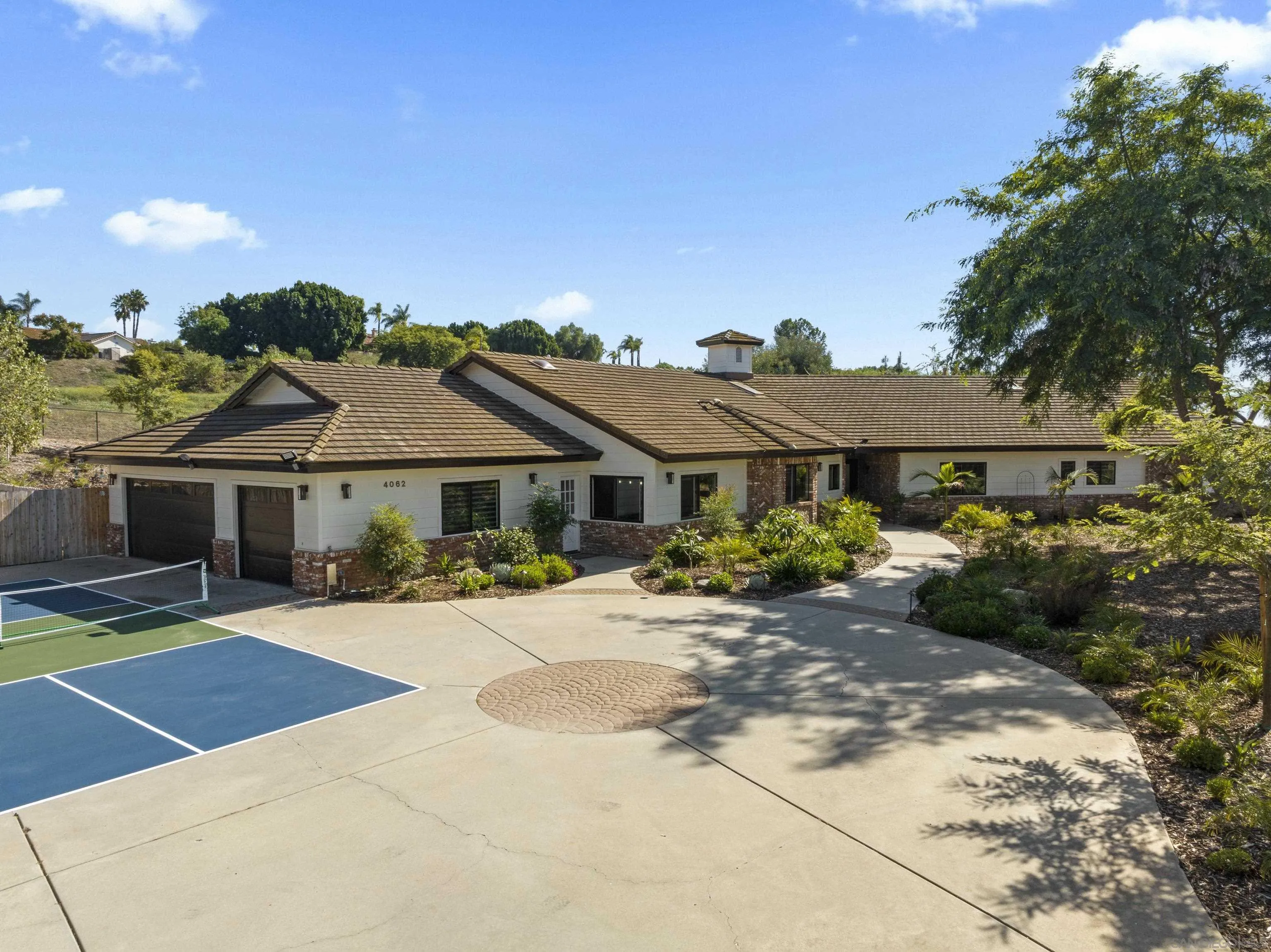 4062 La Canada Road Fallbrook, CA 92028 - Photo 60 of 63 a front view of a house with a garden