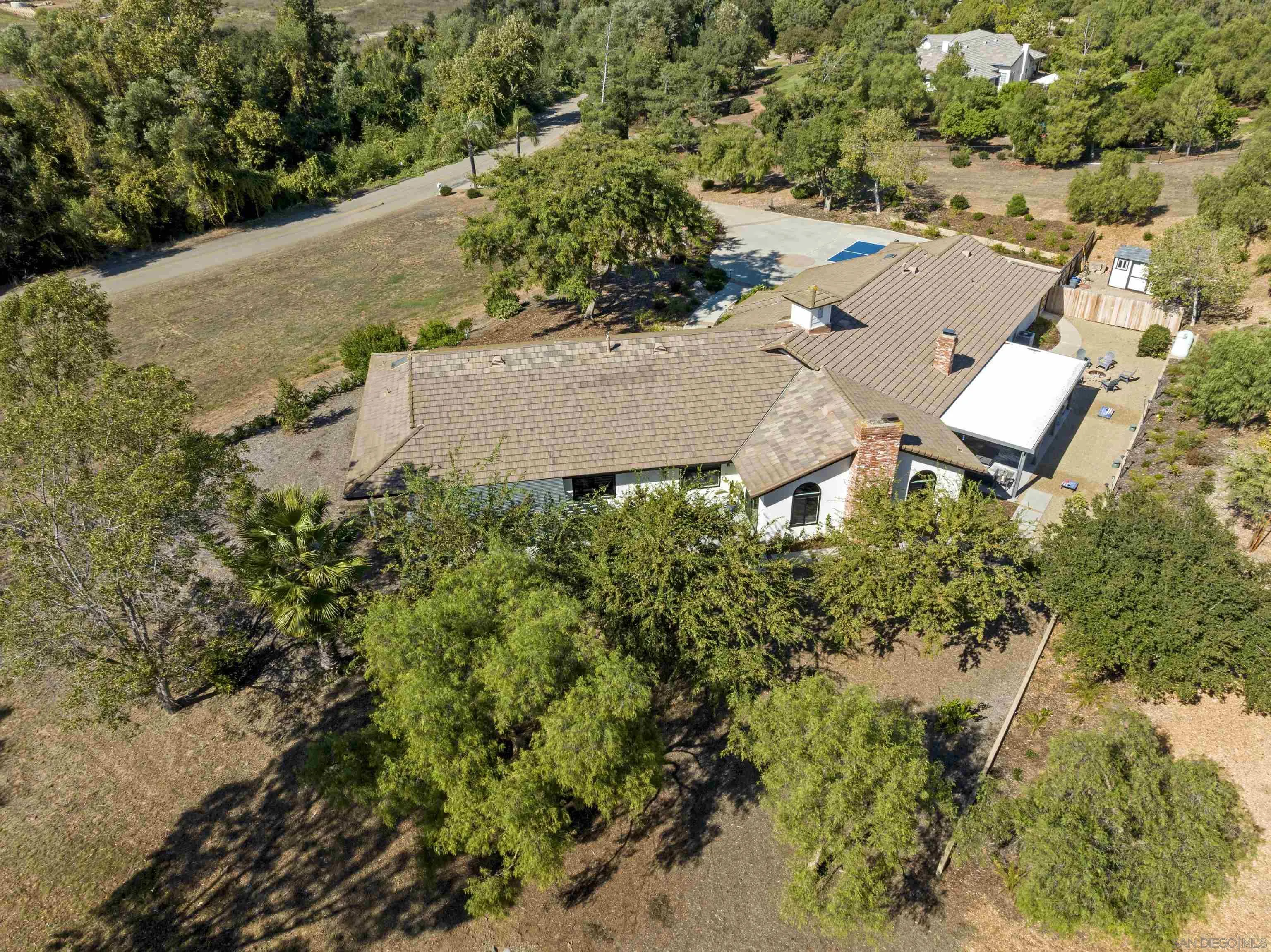 4062 La Canada Road Fallbrook, CA 92028 - Photo 61 of 63 an aerial view of a house with yard and outdoor seating