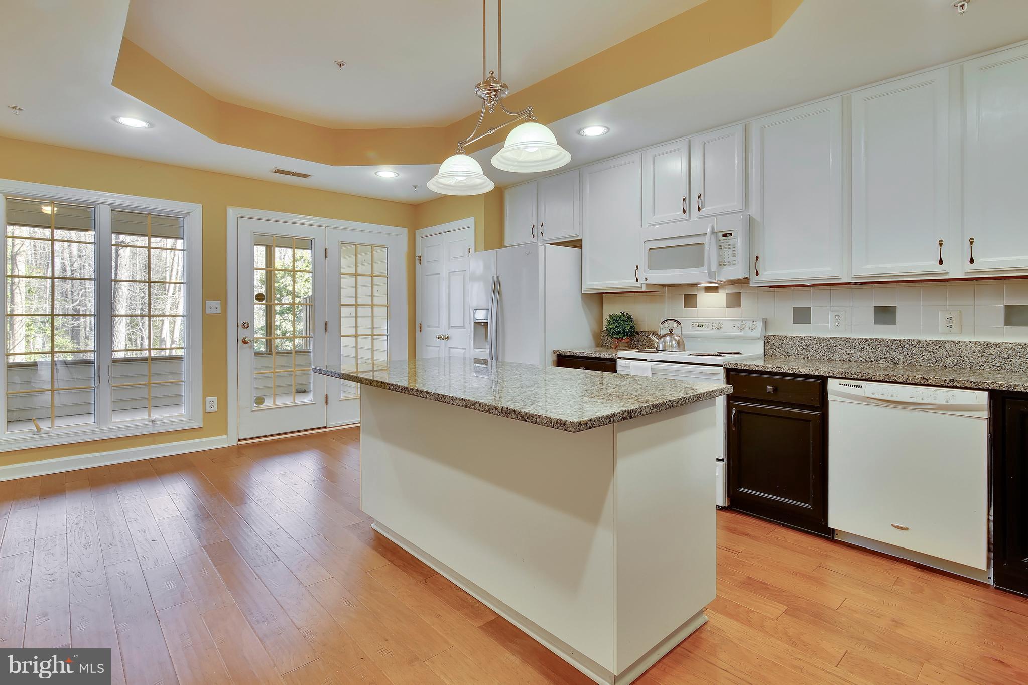 378 Colony Point Place Edgewater, MD 21037 - Photo 11 of 30 Eat in Kitchen overlooking screened porch