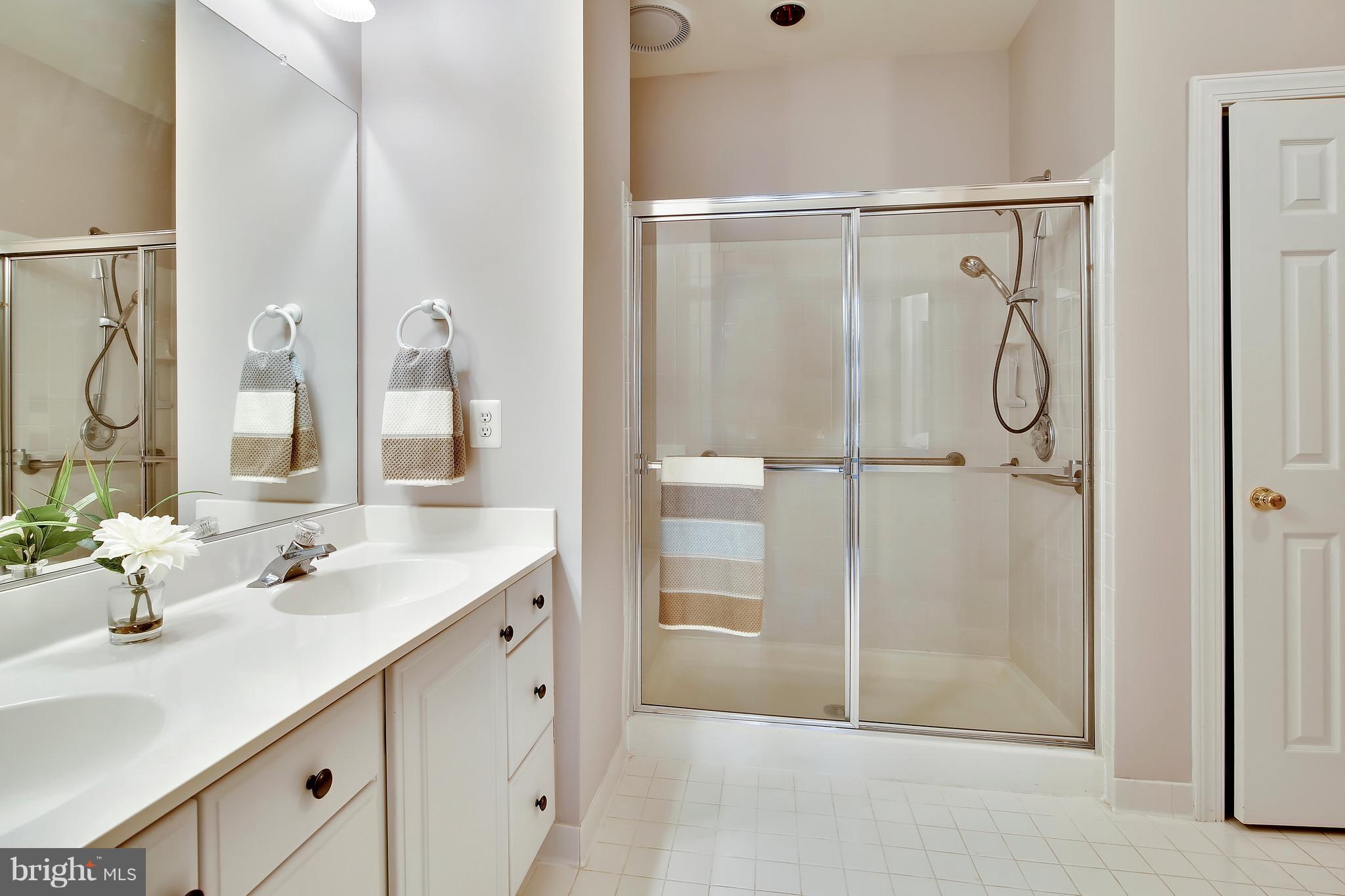 378 Colony Point Place Edgewater, MD 21037 - Photo 14 of 30 Walk in shower features heat lamp