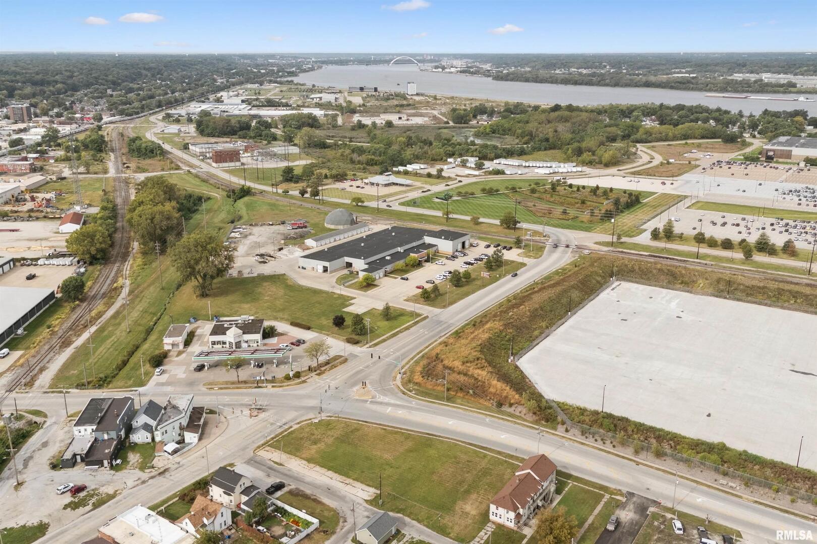 1230 13th Street East Moline, IL 61244 - Photo 7 of 8 an aerial view of residential houses with outdoor space