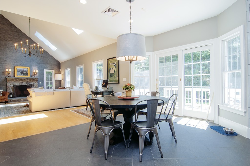 52 Locust Avenue Lexington, MA 02421 - Photo 9 of 28 a view of a dining room with furniture window and outside view