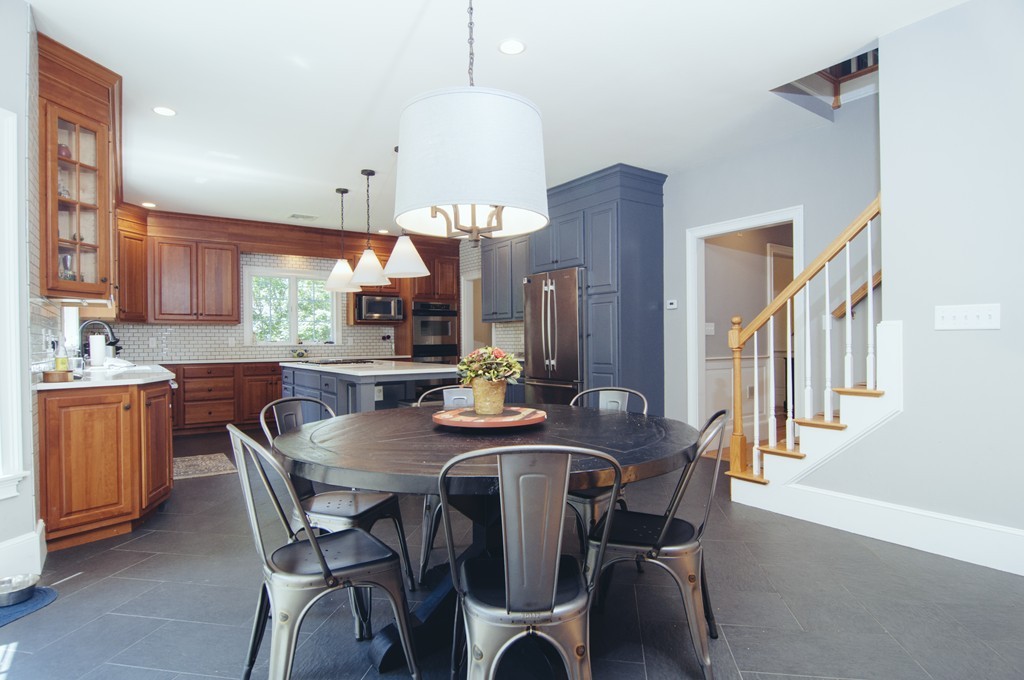 52 Locust Avenue Lexington, MA 02421 - Photo 10 of 28 a view of a dining room with furniture and wooden floor