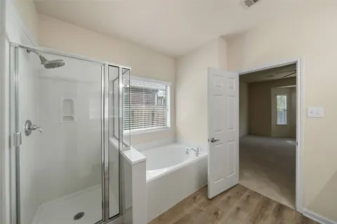 a house view with a garden space