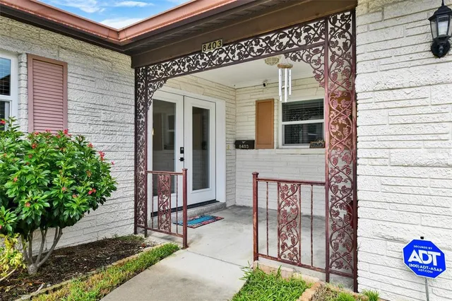 a front view of a house with a porch