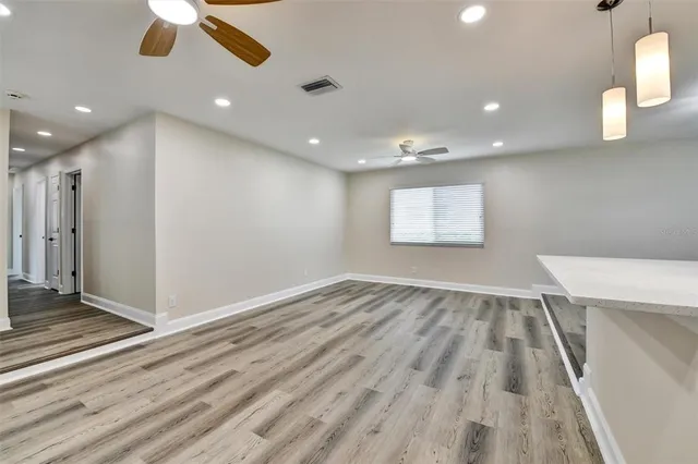 a view of an empty room and window