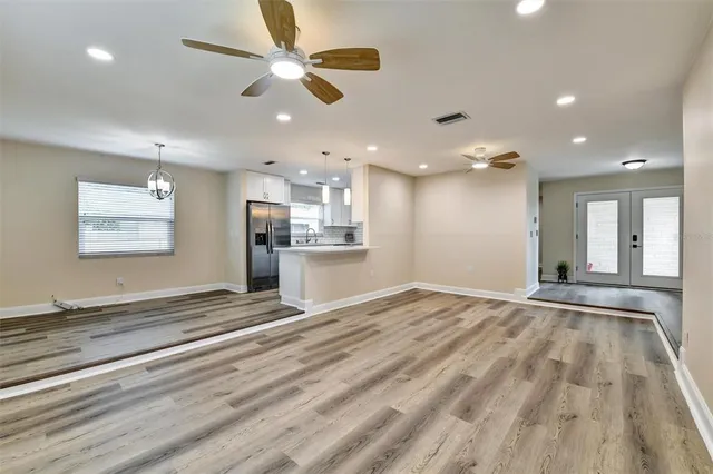 a view of kitchen and windows