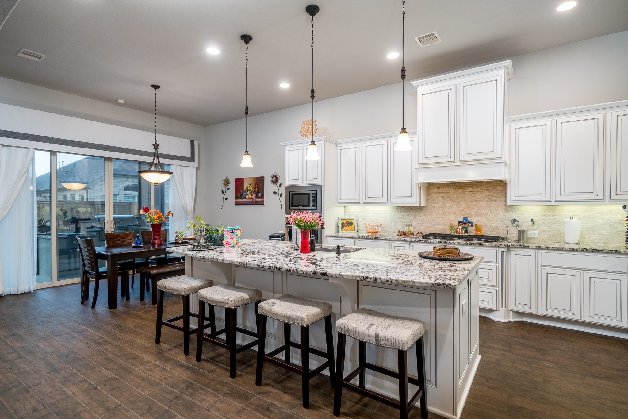 10410 Southern Hawker Conroe, TX 77385 - Photo 29 of 47 Kitchen View with XL preparation island and View to Breakfast Area