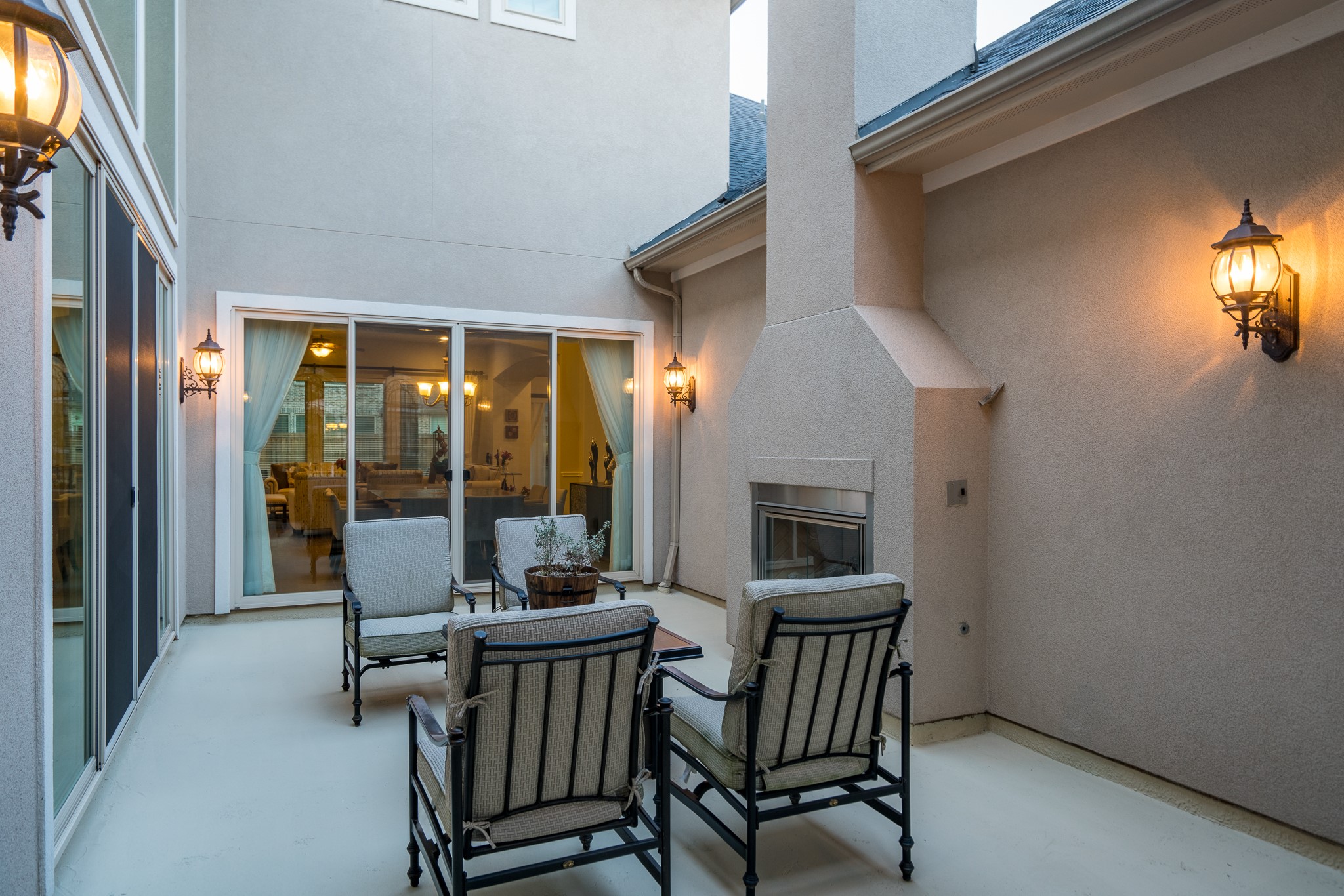10410 Southern Hawker Conroe, TX 77385 - Photo 35 of 47 Internal Patio with Gas Chimney
