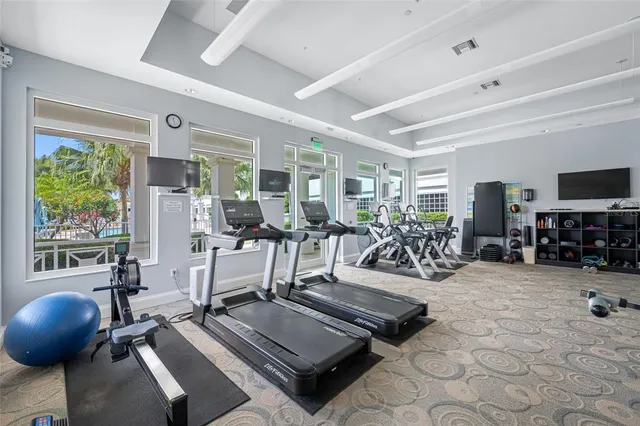 a swimming pool with outdoor seating and yard