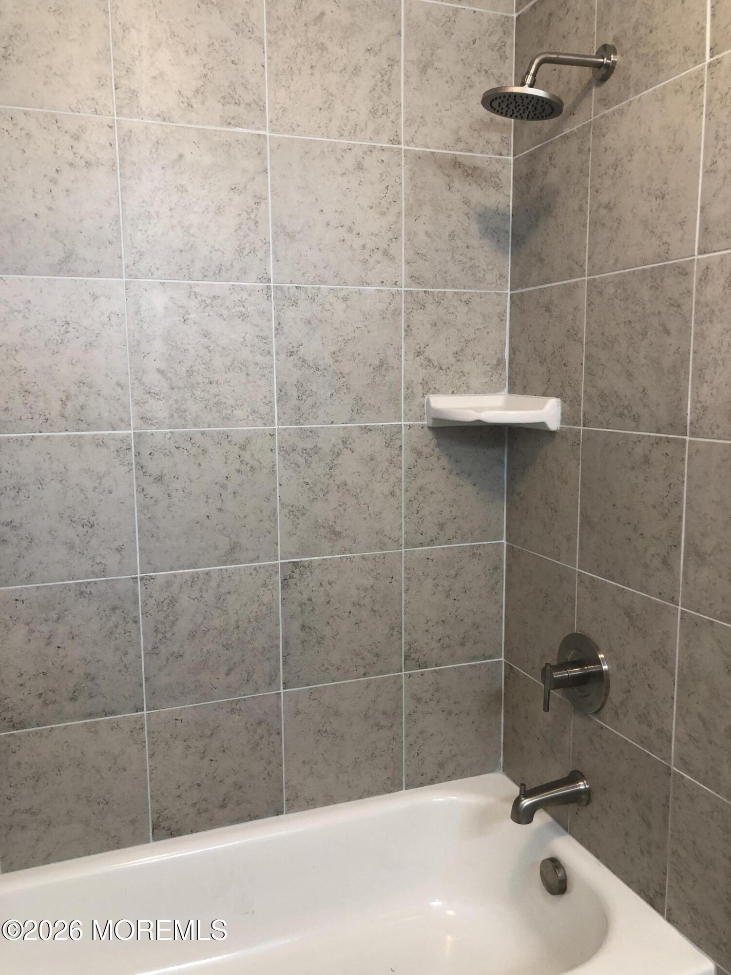 6 Dickinson Road Brick, NJ 08724 - Photo 16 of 17 a bathroom with a shower a toilet and sink