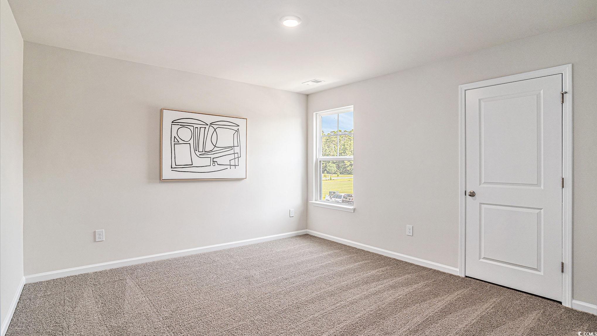 183 Pampa Drive Loris, SC 29569 - Photo 16 of 22 Unfurnished bedroom with light colored carpet and baseboards