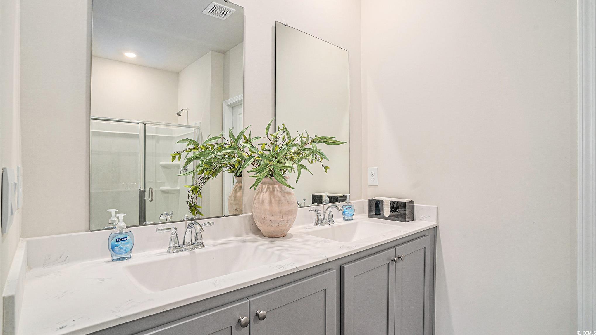 183 Pampa Drive Loris, SC 29569 - Photo 20 of 22 Full bath featuring a shower stall and double vanity