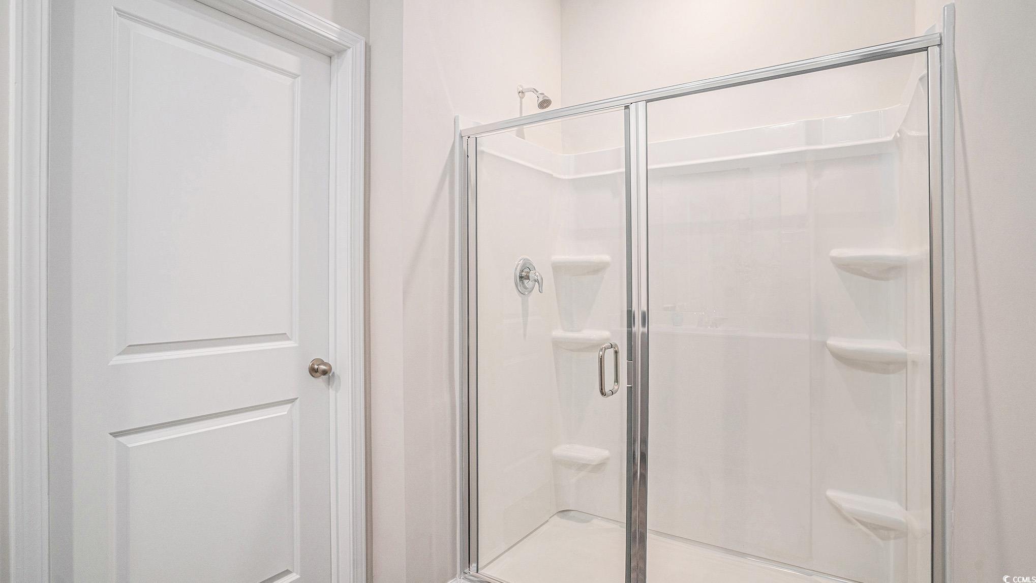 183 Pampa Drive Loris, SC 29569 - Photo 21 of 22 Bathroom featuring a stall shower