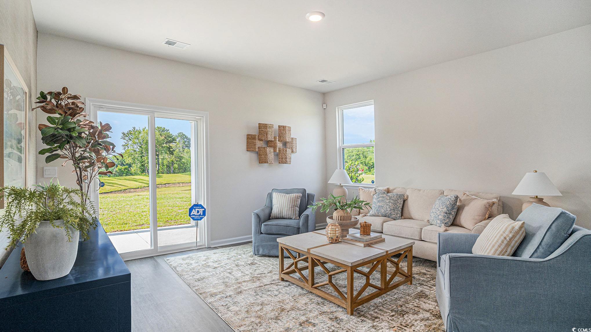 183 Pampa Drive Loris, SC 29569 - Photo 4 of 22 Living room with wood finished floors and recessed lighting