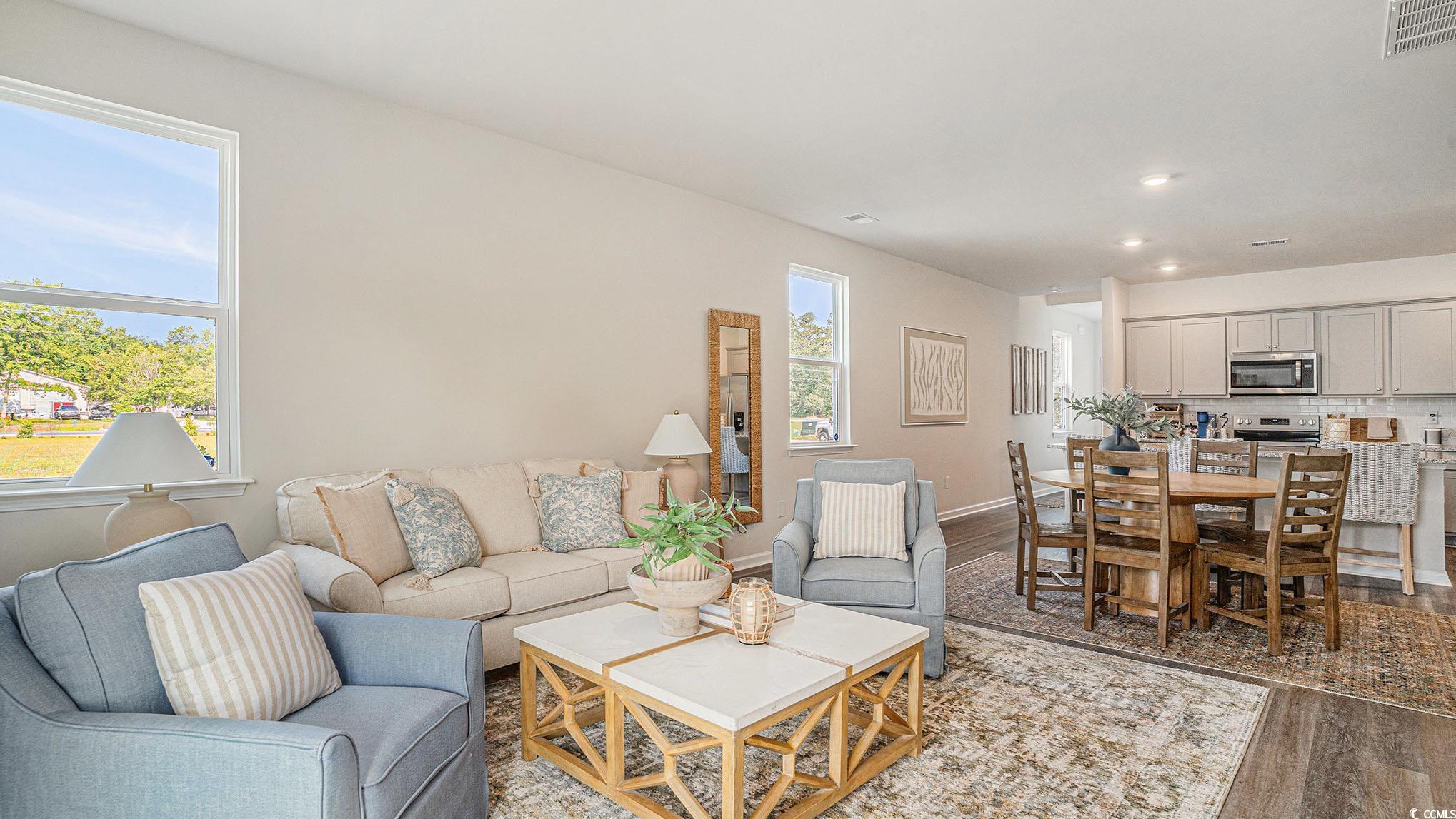 183 Pampa Drive Loris, SC 29569 - Photo 5 of 22 Living area with dark wood-style floors and recessed lighting