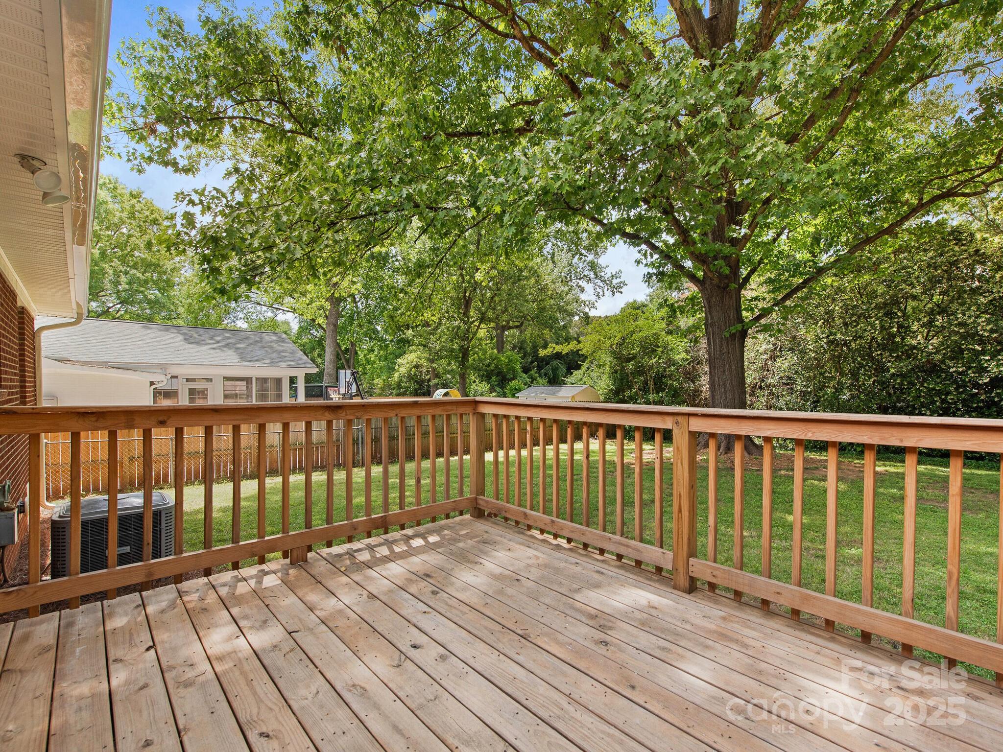 1422 Burnley Road Charlotte, NC 28210 - Photo 24 of 29 a view of balcony with wooden floor