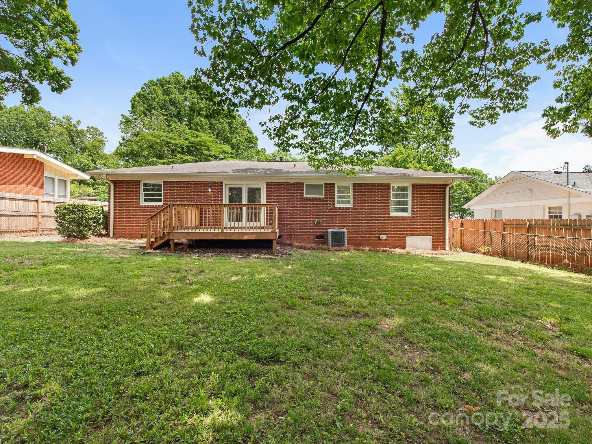 1422 Burnley Road Charlotte, NC 28210 - Photo 29 of 29 a front view of house with yard and green space