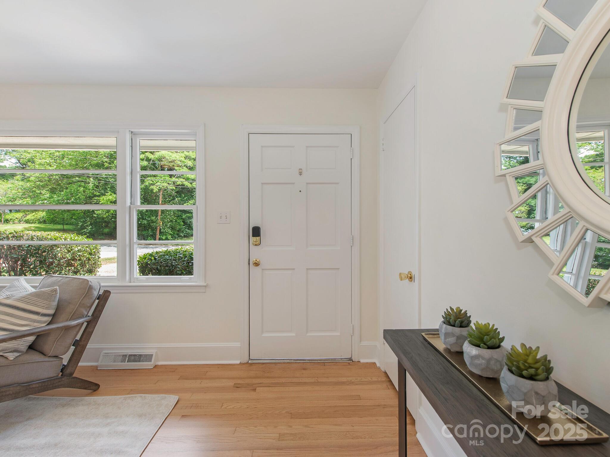 1422 Burnley Road Charlotte, NC 28210 - Photo 3 of 29 a living room with furniture and a window