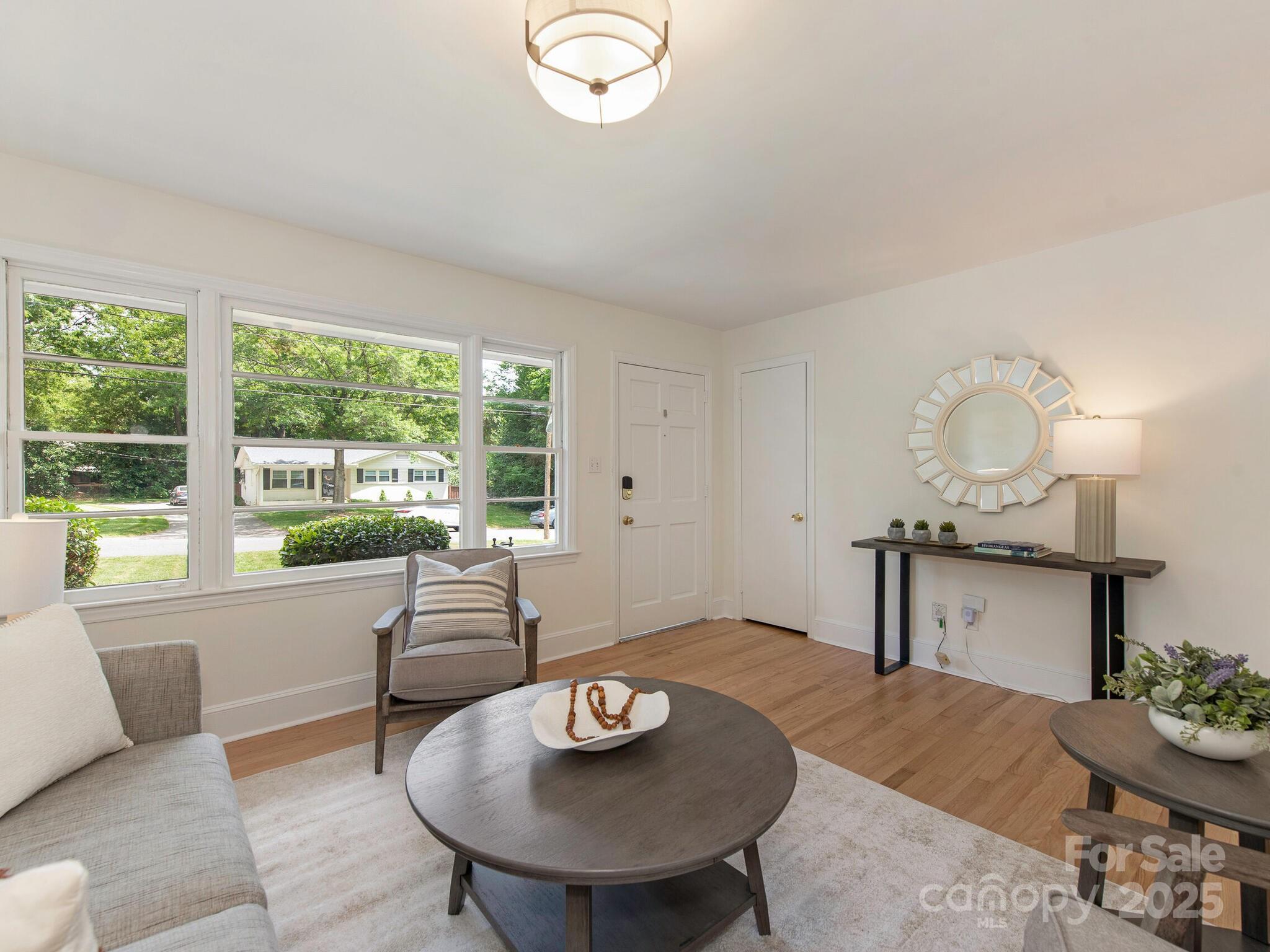 1422 Burnley Road Charlotte, NC 28210 - Photo 6 of 29 a living room with furniture and window