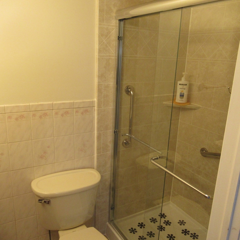 29 Villa Avenue Everett, MA 02149 - Photo 10 of 16 a bathroom with a toilet and a shower
