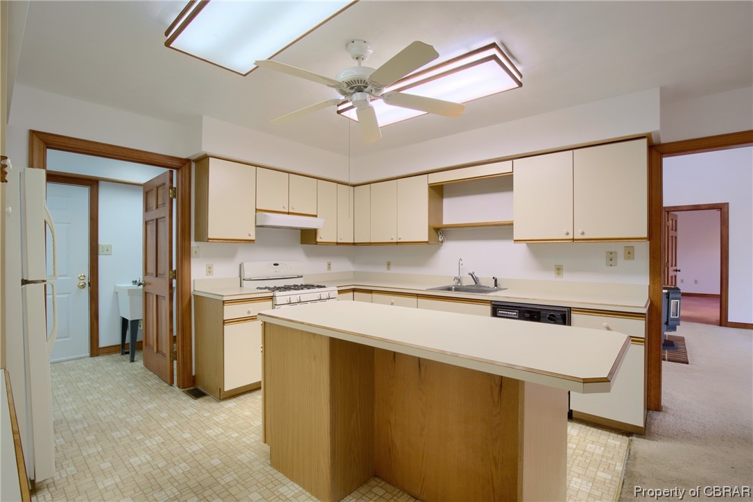 195 Mill Lane Road Cardinal, VA 23025 - Photo 23 of 48 a kitchen with a stove cabinets and a refrigerator
