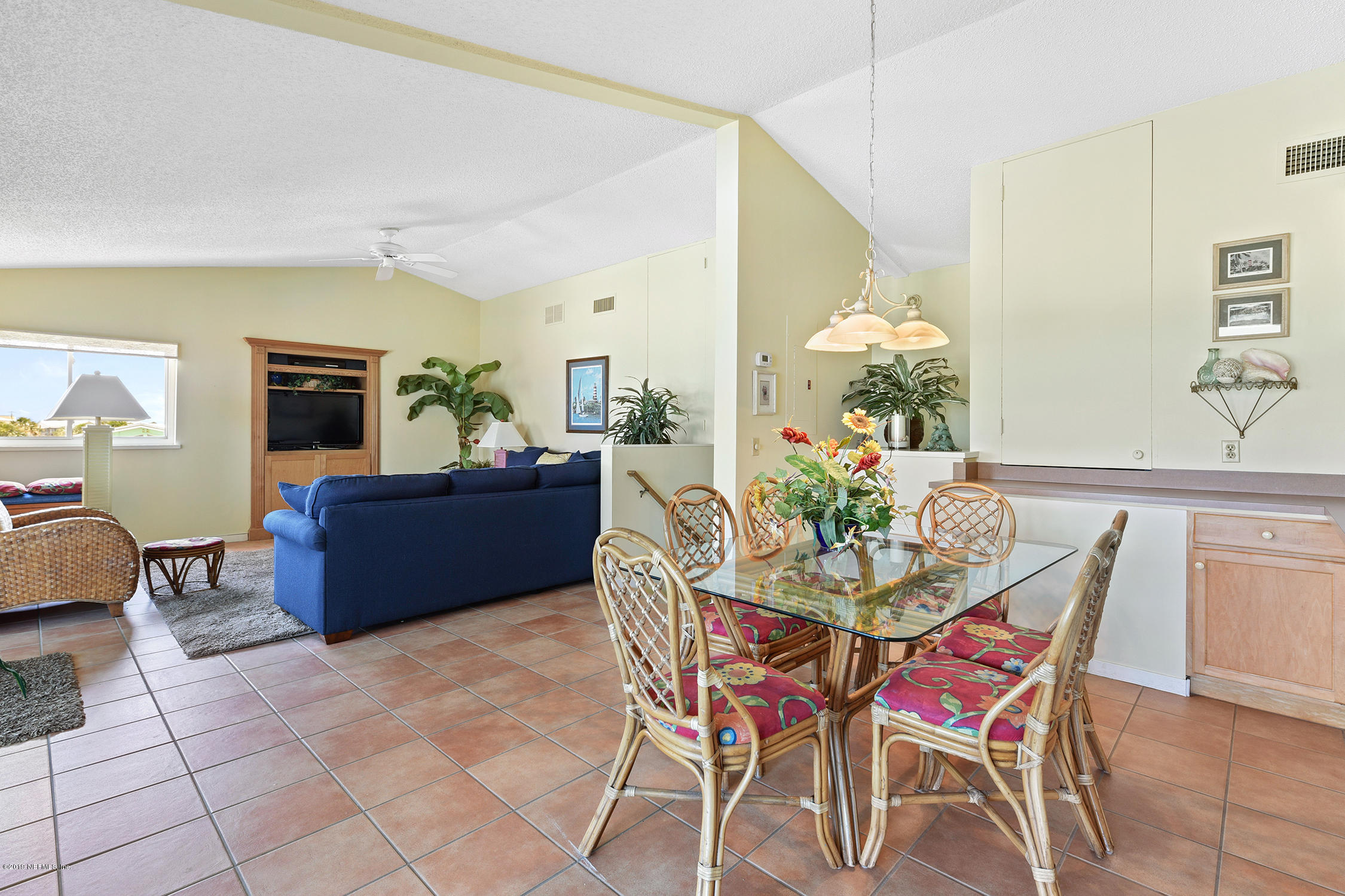 8850 Old A1A, Unit 9 St. Augustine, FL 32080 - Photo 16 of 37 a view of a dining room with furniture